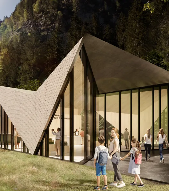 Modern visitor center with angular roof design surrounded by forest and tourists near mountain path